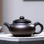 Исинский чайник ручной работы Фан Гу Черный принц, черная глина хей ни